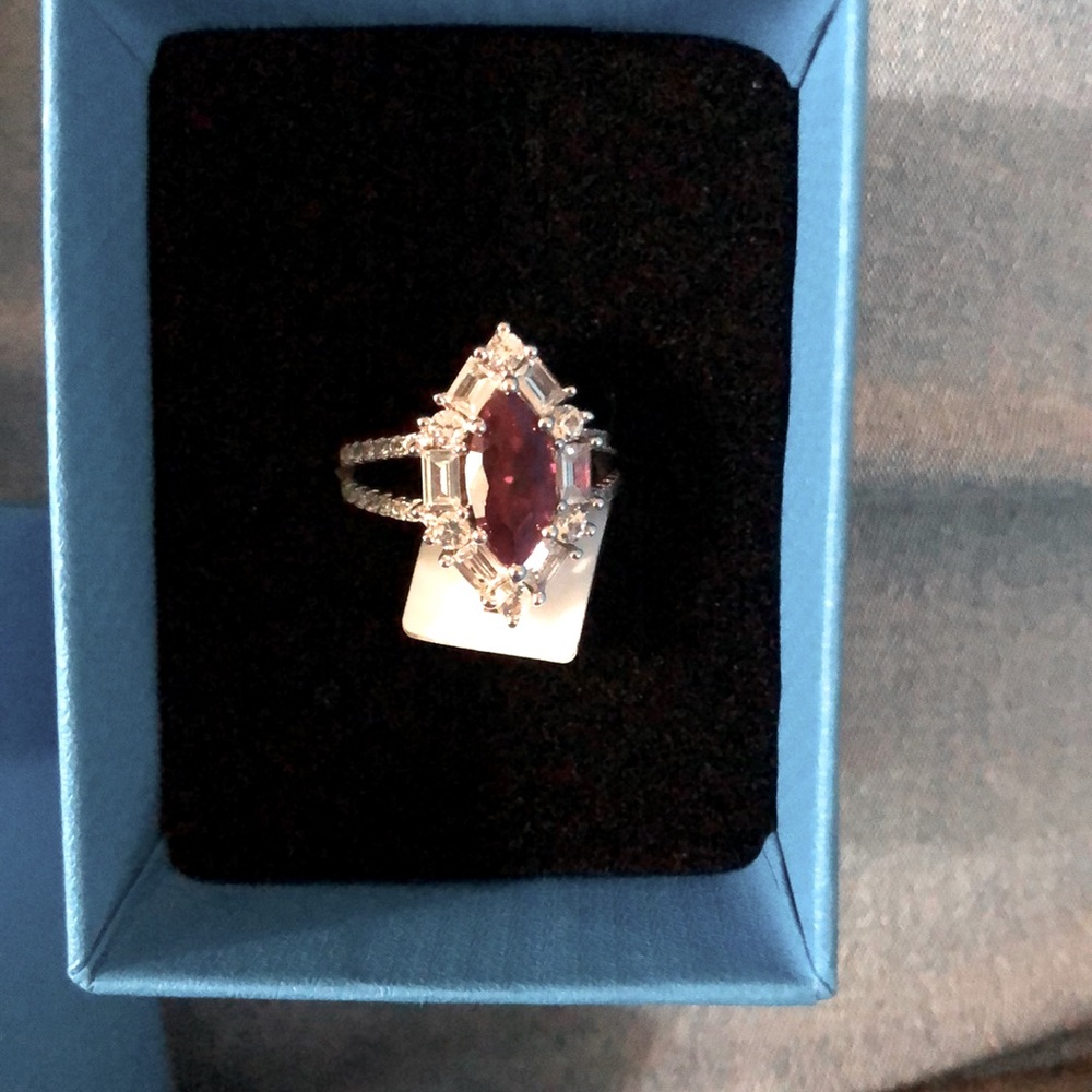 New in box. 1.66 carats lab-created marquis cut Ruby.